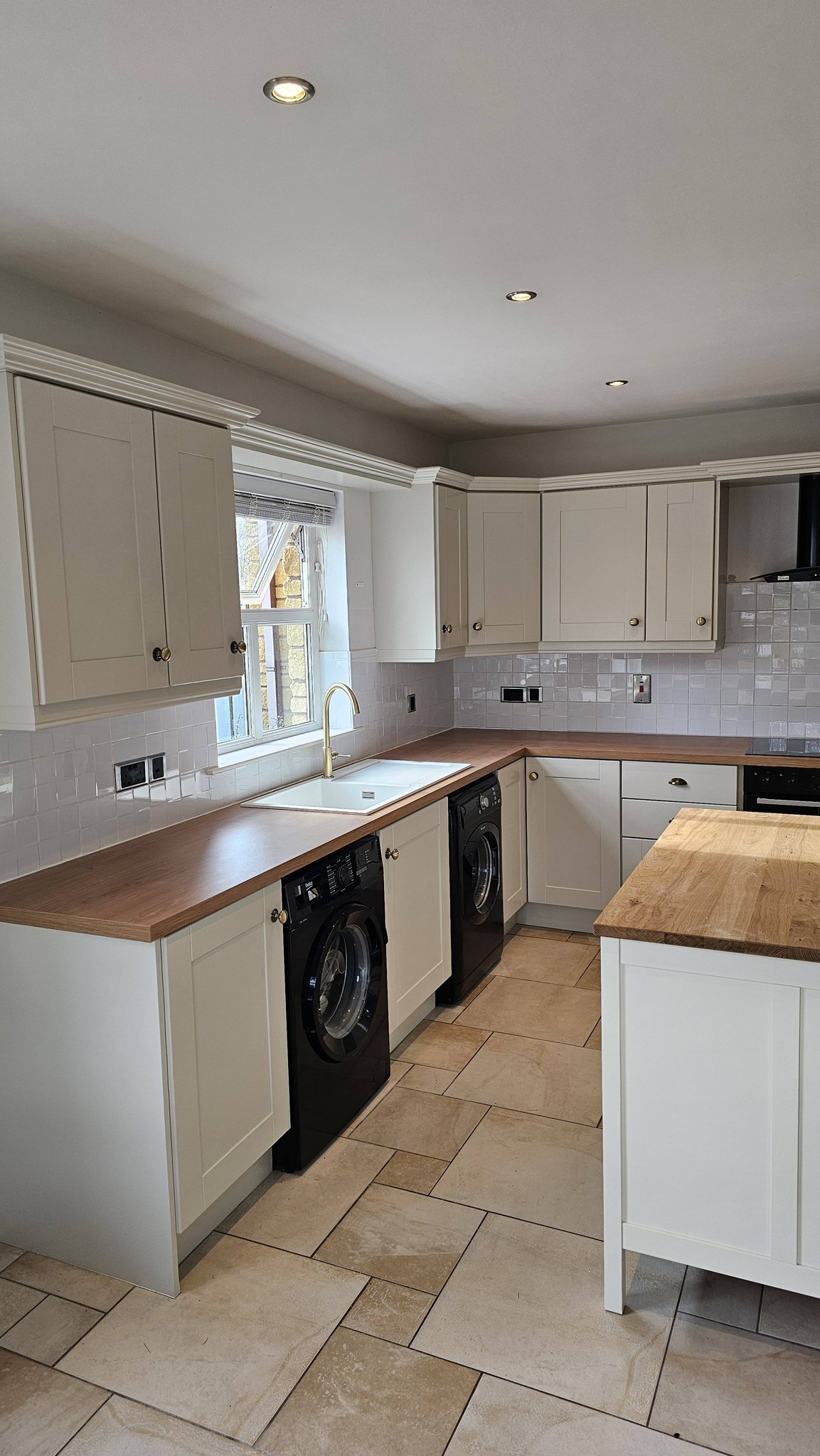 Kitchen cabinet spraying in Antrim transforming tired kitchens with modern colour finishes.