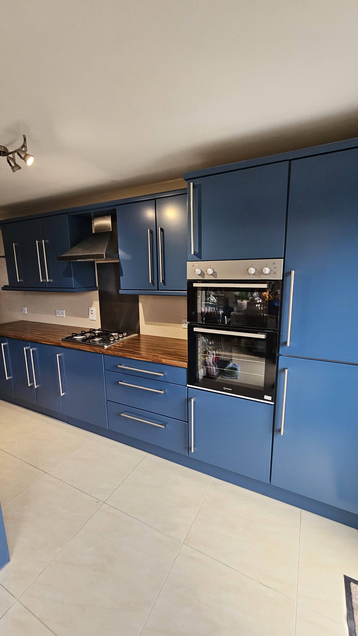Affordable kitchen spraying in Northern Ireland by experienced spray painting specialists.