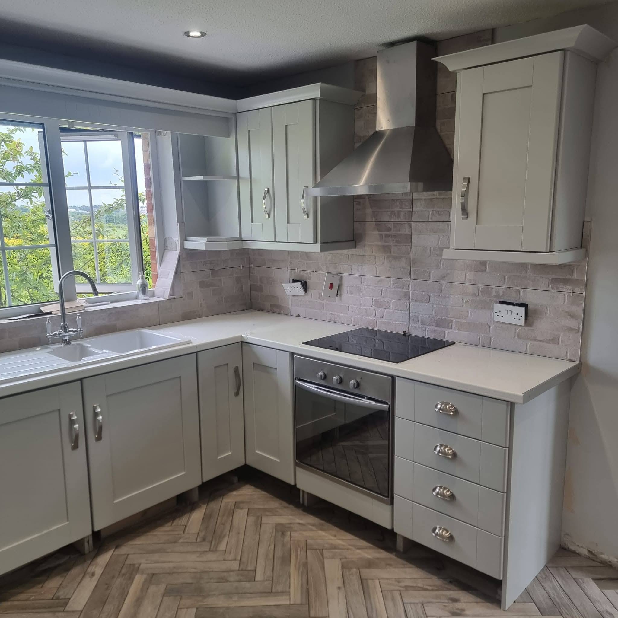 Kitchen spraying Belfast specialists delivering modern spray painted kitchen transformations across Northern Ireland.